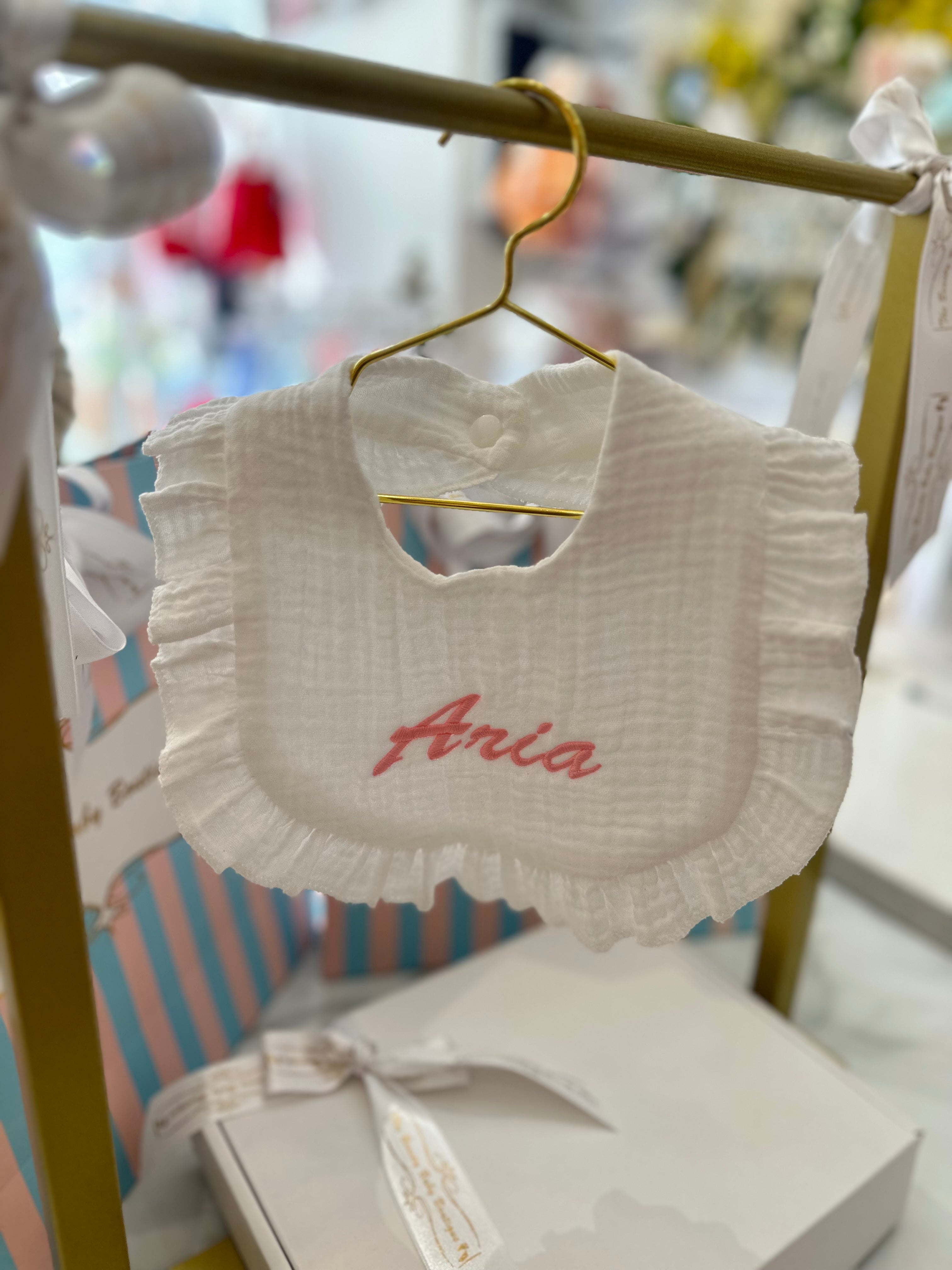 White frilly bib