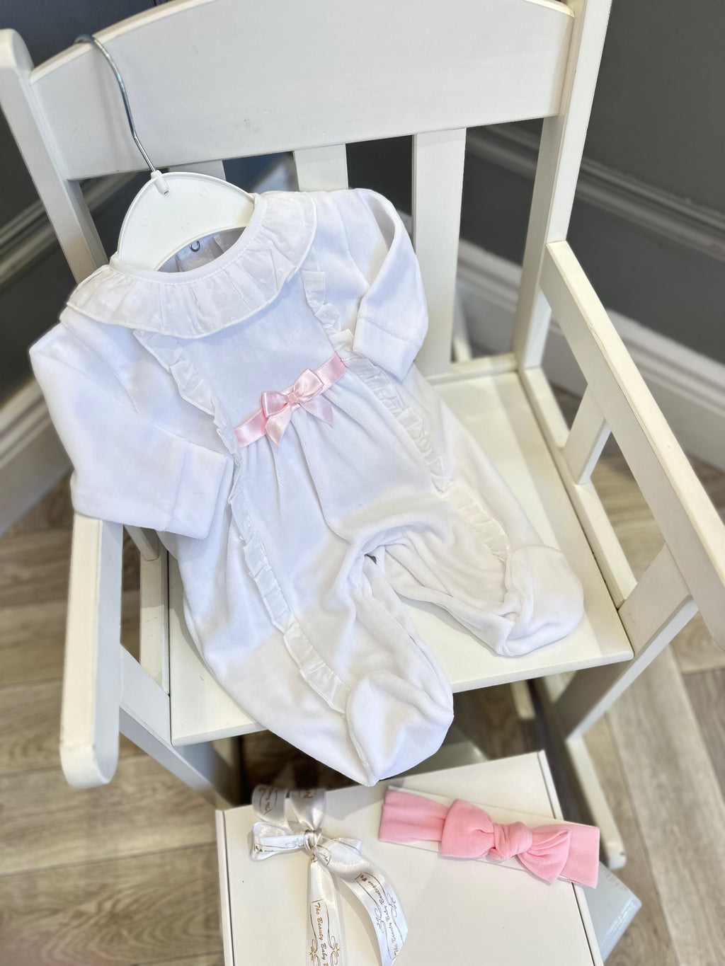 Baby grow with pink bow