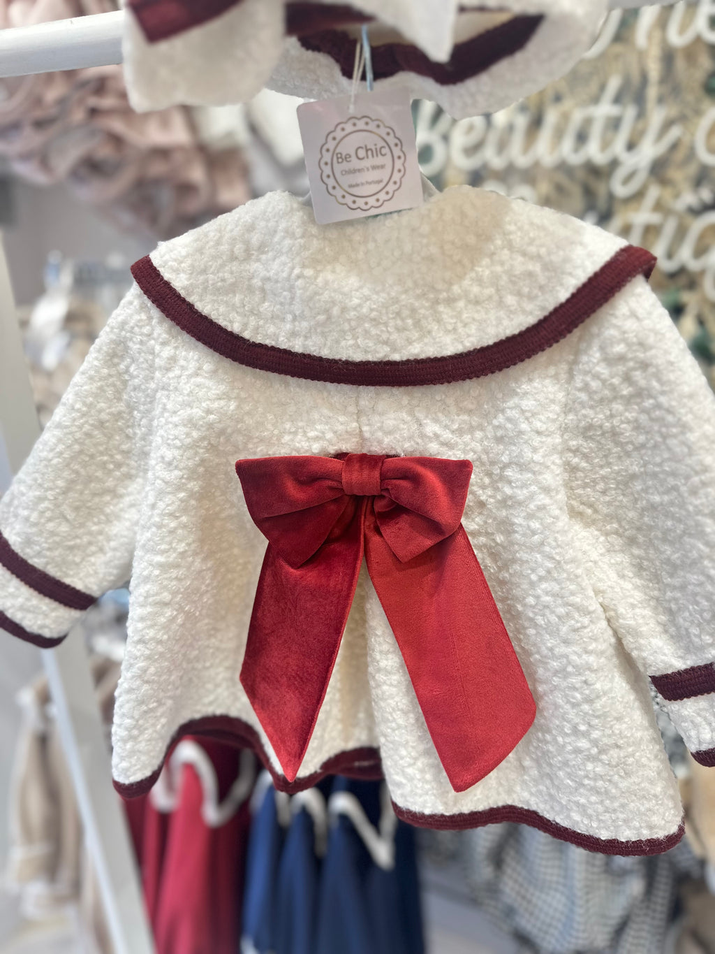Be Chic red trim boule coat