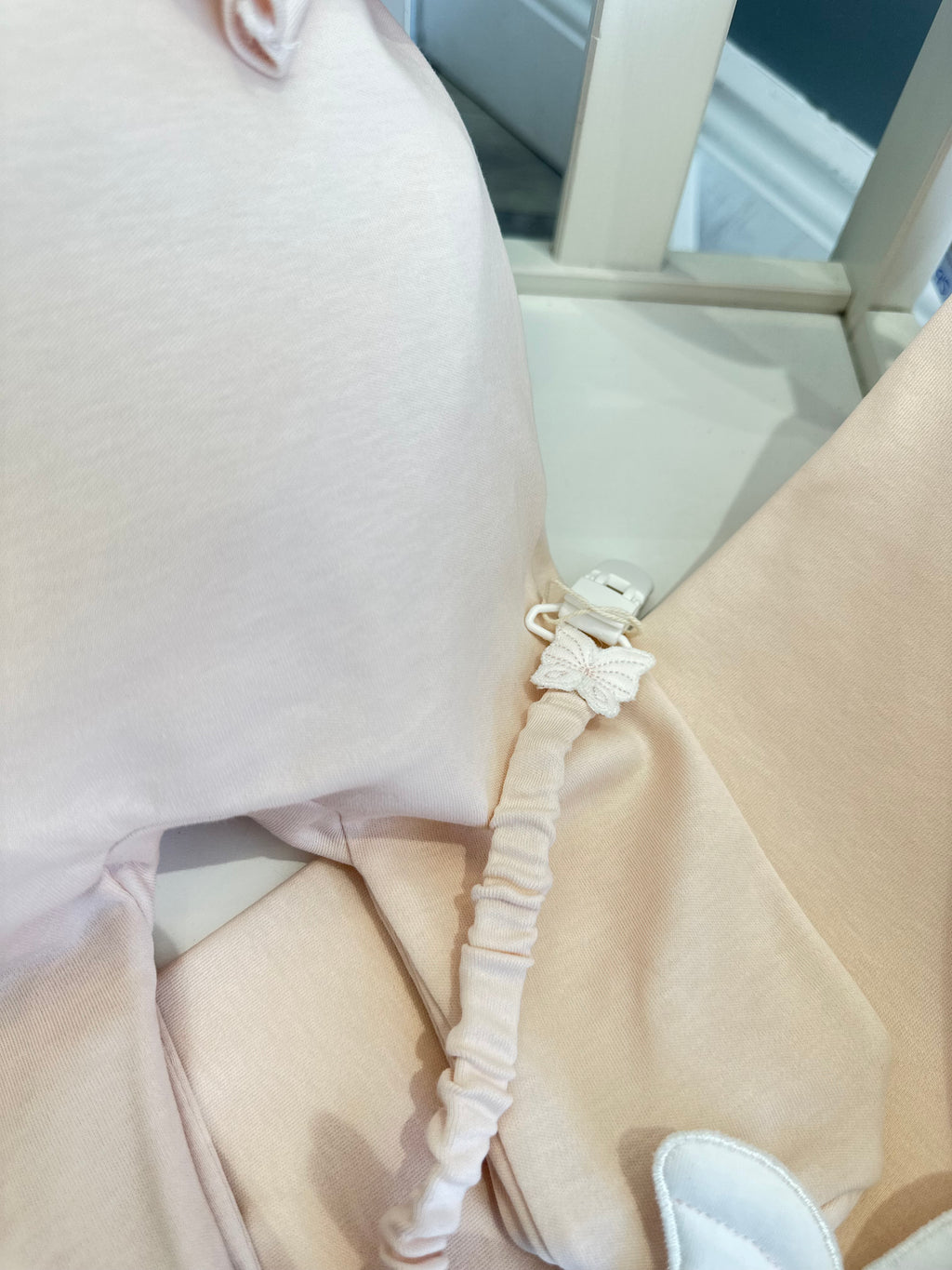 Baby Gi peach butterfly soother clip