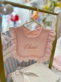 Pink frilly bib