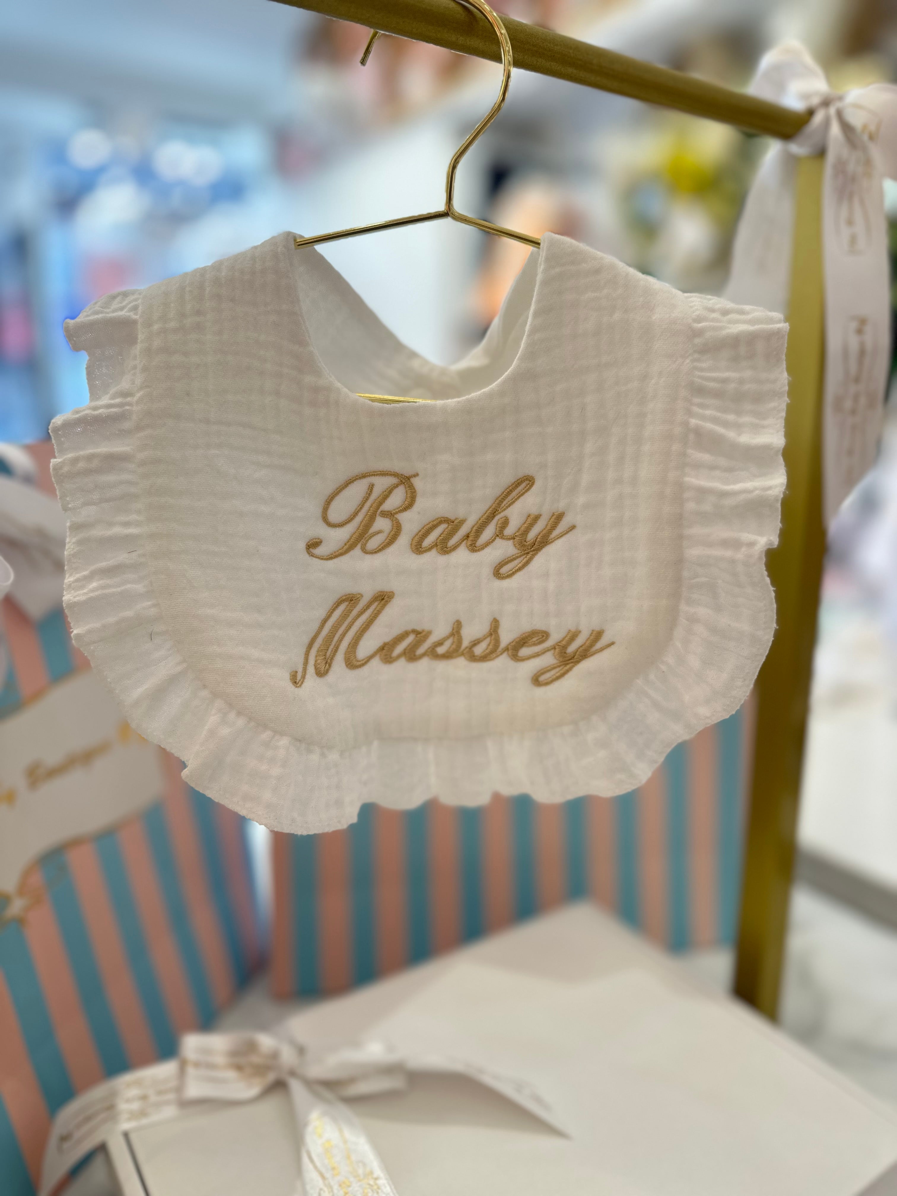 White frilly bib