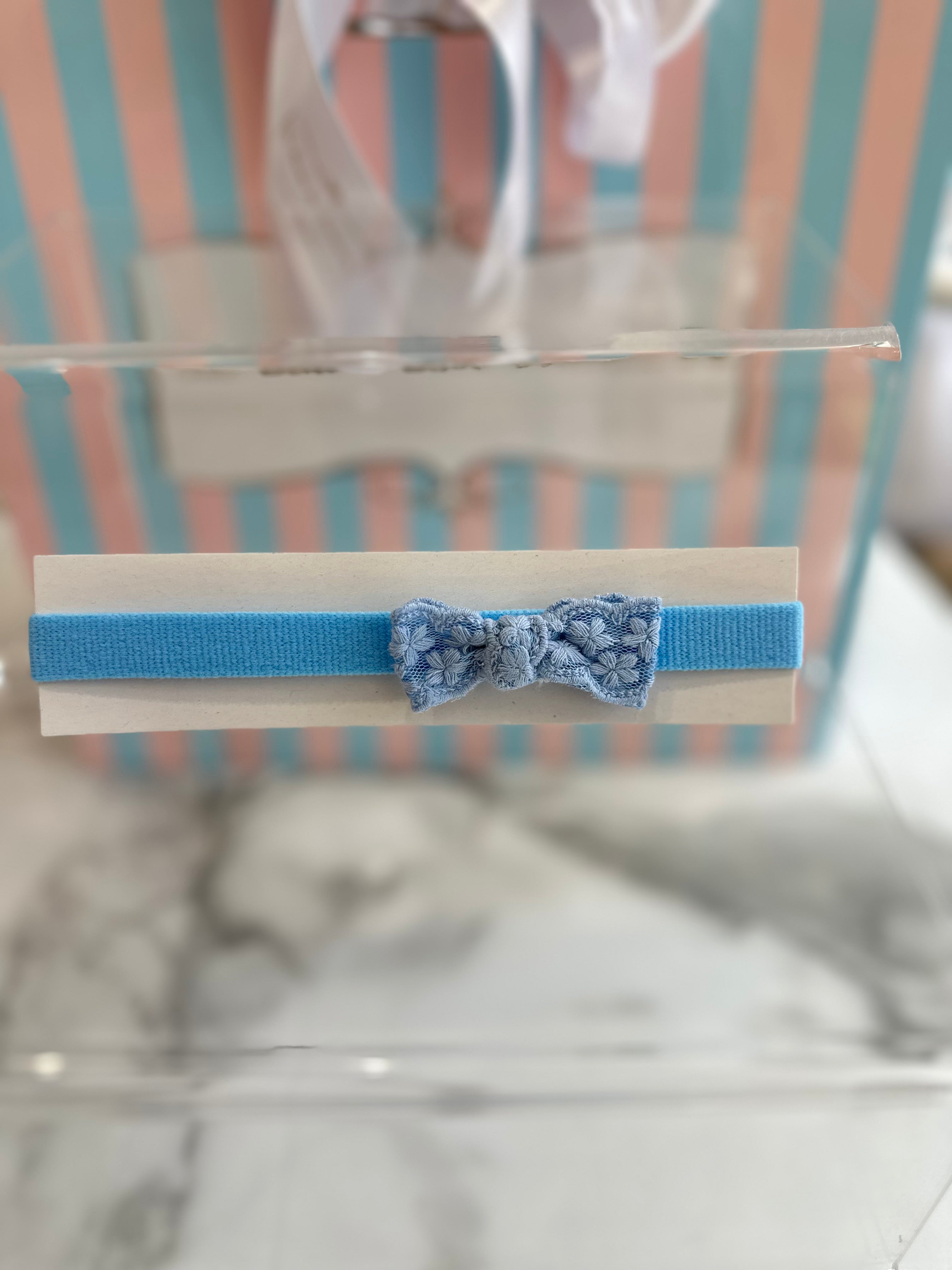 Blue headband with lace bow